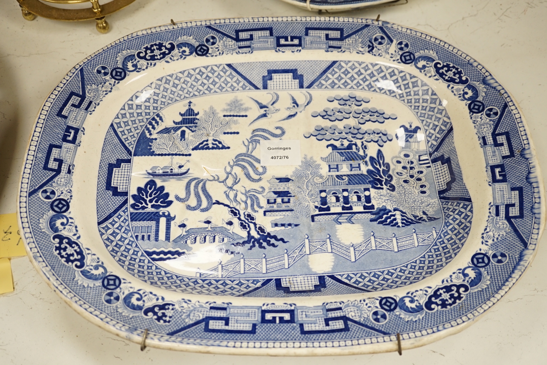 A 19th century blue and white meat platter and four similar dishes